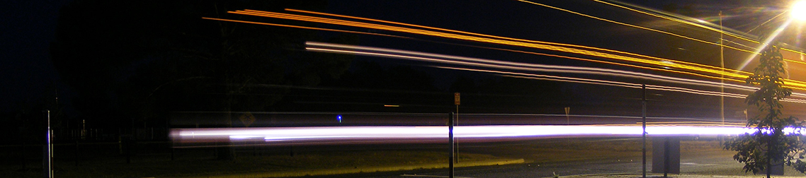 Long exposure of lights at night of a track passing by